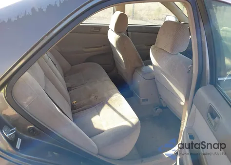 2003 Toyota Camry Le z USA, uszkodzony, nr VIN 4T1BE30K13U725595